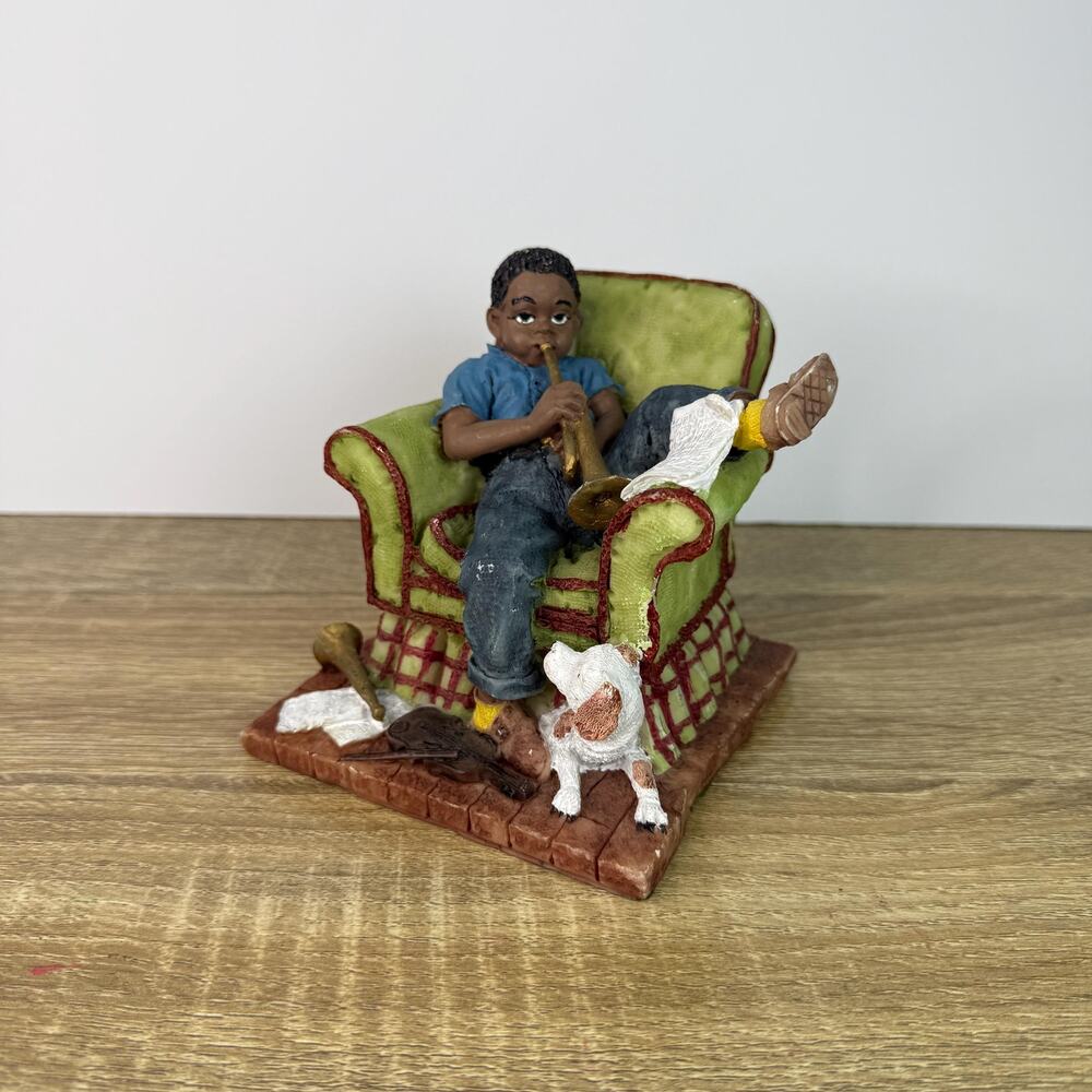 Vintage Boy Figurine Sitting On Chair with Saxophone and Dog Figure